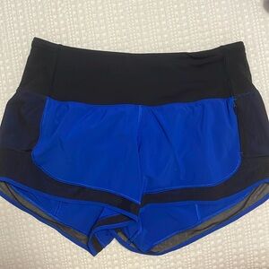 Lululemon size 4 shorts. Blue and black.
